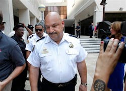 New Orleans Police Deputy Superintendent Kirk Bouyelas leaves Federal Court the officers were convicted. New Orleans Police Deputy Superintendent Kirk Bouyelas leaves Federal Court the officers were convicted.