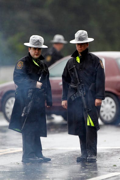 Pennsylvania State Police troopers man a roadblock in Furlong.