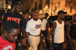 Philadelphia Mayor Michael Nutter walks with community leaders and several teens in the Center City neighborhood. Philadelphia Mayor Michael Nutter walks with community leaders and several teens in the Center City neighborhood.