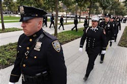 New York police, firefighters and Port Authority police arrive at the Sept. 11 Memorial. New York police, firefighters and Port Authority police arrive at the Sept. 11 Memorial.