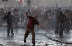 Protesters hurl objects at police in Rome, Saturday, Oct. 15, 2011. Protesters hurl objects at police in Rome, Saturday, Oct. 15, 2011.