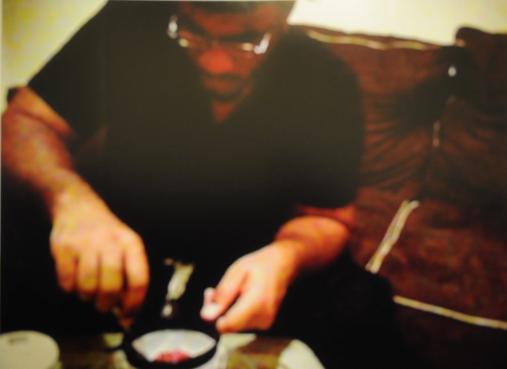 This police photo shows who authorities say is Jose Pimentel making a bomb.