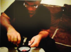 This police photo shows who authorities say is Jose Pimentel making a bomb. This police photo shows who authorities say is Jose Pimentel making a bomb.