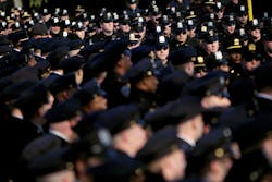 Police officers line up for Officer Peter Figoski's funeral in Babylon, N.Y. Police officers line up for Officer Peter Figoski's funeral in Babylon, N.Y.