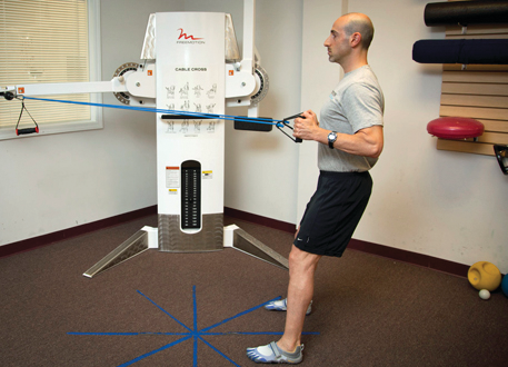 Squat to row position two