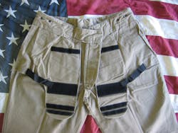 Each front pocket has an adjustable holster built in. Each front pocket has an adjustable holster built in.