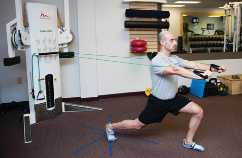 Lower down until just off the floor and pause, as you raise back up press the band out just like a chest press.