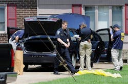 Law enforcement agents search a car at the home of reputed Connecticut mobster Robert Gentile in Manchester, Conn., looking for paintings stolen from Boston&apos;s Isabella Stewart Gardener Museum in 1990, worth half a billion dollars.