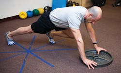 The prone plate push can work your entire body if done correctly.