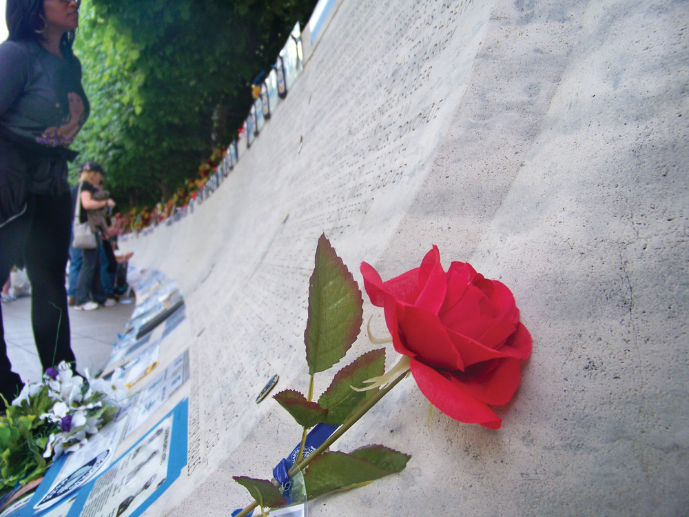 The names of 163 law enforcement officers who died in the line of duty in 2011 were dedicated on the National Law Enforcement Officers Memorial Sunday evening, in Washington, D.C.'s historic Judiciary Square during the 24th annual Candlelight Vigil.