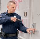 Lshspolicegunpointedatdoor 10727770