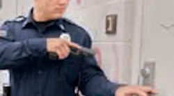 Lshspolicegunpointedatdoor 10727770