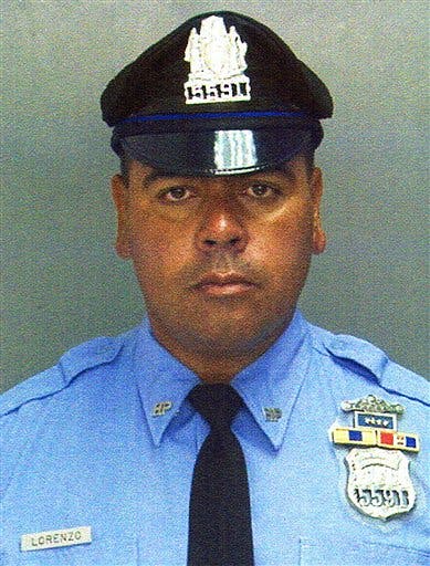 This undated photo provided by the Philadelphia Police Department shows Officer Brian Lorenzo. Authorities say Lorenzo was on a motorcycle when he was struck and killed by a vehicle heading the wrong way on Interstate 95, early Sunday, July 8, 2012. Police said Lorenzo was pronounced dead at the scene. He was a 23-year veteran of the force and is survived by a wife and three children. Officers are holding the driver, a 48-year-old man from Levittown, and say charges against him are expected.