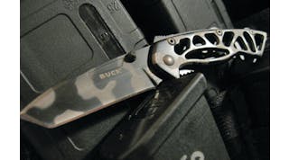 Buck Knives Small Bones Knife on vest