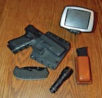 Your travel Every Day Carry (EDC): gun, spare mag, knife, light, GPS