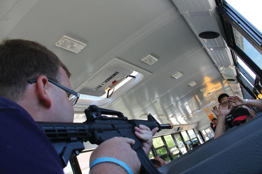 During the bus-clearing scenario, teams ran the drill several times and were presented with variations on shooter location and intelligence from inside the bus. Trainees and role players wore the tactical training system from irTactical, the company that hosted the event.