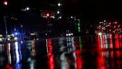 Lights are reflected on Canal Street as a police officer patrolling the area passes a pedestrian as storm bands from Hurricane Isaac hit, Tuesday, Aug. 28, 2012, in New Orleans, Louisiana. Isaac, a massive storm spanning nearly 200 miles from its center, made landfall Tuesday evening near the mouth of the Mississippi River. Lights are reflected on Canal Street as a police officer patrolling the area passes a pedestrian as storm bands from Hurricane Isaac hit, Tuesday, Aug. 28, 2012, in New Orleans, Louisiana. Isaac, a massive storm spanning nearly 200 miles from its center, made landfall Tuesday evening near the mouth of the Mississippi River.