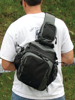 5.11's Zone Assault Pack is a medium-size sling pack that has a well-designed concealed carry compartment for a handgun. 5.11's Zone Assault Pack is a medium-size sling pack that has a well-designed concealed carry compartment for a handgun.