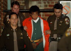 In this Tuesday, Jan. 14, 2003 file photo, sniper shooting suspect John Lee Malvo is escorted from court after his preliminary hearing in Fairfax, Va. In this Tuesday, Jan. 14, 2003 file photo, sniper shooting suspect John Lee Malvo is escorted from court after his preliminary hearing in Fairfax, Va.