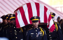 An honor guard carries the casket containing to remains of Atlanta Police Helicopter Pilot Richard J. Halford during a memorial service on Nov. 9. An honor guard carries the casket containing to remains of Atlanta Police Helicopter Pilot Richard J. Halford during a memorial service on Nov. 9.