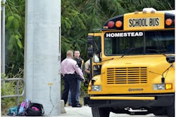 Police investigate the scene of a shooting on a school bus in Homestead, Fla., near Miami, Tuesday, Nov. 20, 2012. Police investigate the scene of a shooting on a school bus in Homestead, Fla., near Miami, Tuesday, Nov. 20, 2012.