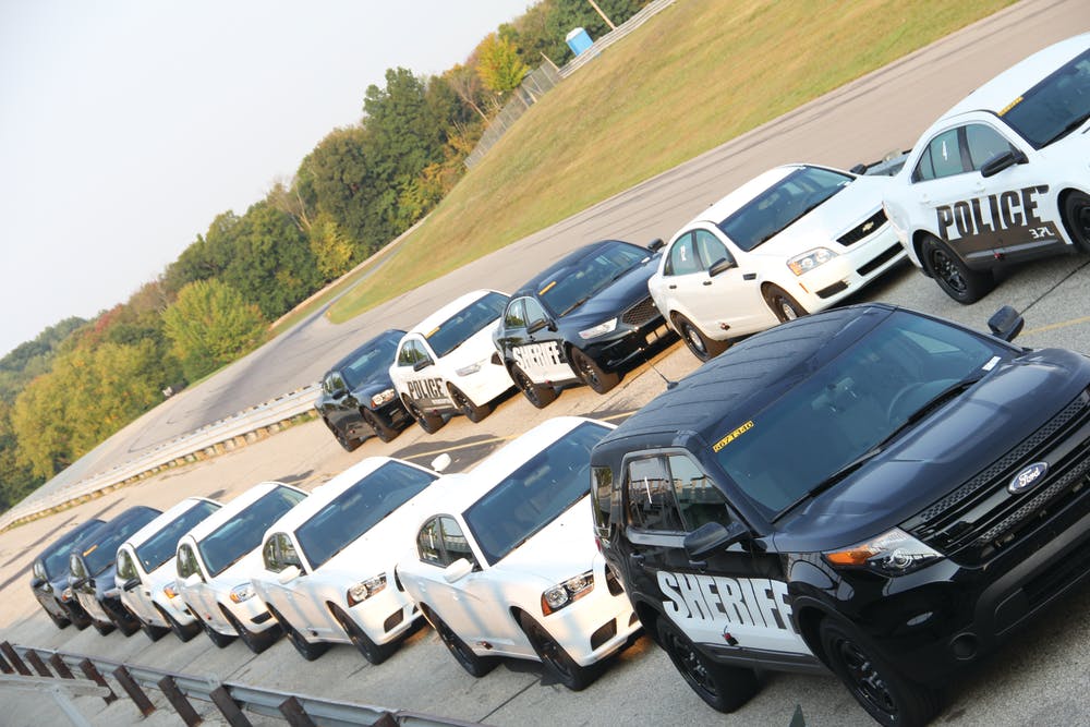 The test vehicles set in line during the dynamic handling portion of the Michigan State Police Vehicle Evaluations.