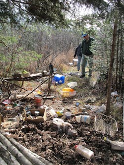Authorities are seen at the Chequamegon-Nicolet National Forest in Wisconsin at the site of a suspected marijuana grow. Authorities are seen at the Chequamegon-Nicolet National Forest in Wisconsin at the site of a suspected marijuana grow.