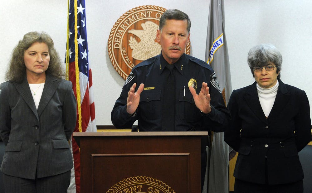 Anchorage Police Chief Mark Mew, center, speaks with reporters about the apparent suicide death of Israel Keyes.