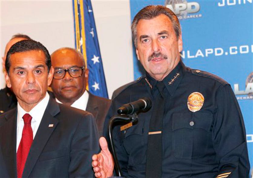 LAPD Chief Charles Beck, right , and Los Angeles Mayor Antonio Villaraigosa, left, speak at a news conference on school safety on Dec. 17.