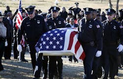 Officers carry the casket containing the remains of Memphis Police Officer Martoiya Lang at Southwoods Memorial Park on Dec. 21. Officers carry the casket containing the remains of Memphis Police Officer Martoiya Lang at Southwoods Memorial Park on Dec. 21.