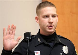 Manchester Police Officer Daniel Doherty is sworn in before testifying during the trial for the man who shot him, Myles Webster, on Dec, 5.