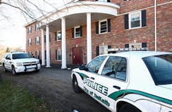 DeKalb police vehicles sit outside the Pi Kappa Alpha house in DeKalb, Ill. DeKalb police vehicles sit outside the Pi Kappa Alpha house in DeKalb, Ill.