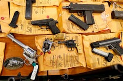 Guns are on display during a news conference talking about the seizure of weapons during the Passaic River Corridor Initiative on Dec. 5 in Newark, N.J. Guns are on display during a news conference talking about the seizure of weapons during the Passaic River Corridor Initiative on Dec. 5 in Newark, N.J.
