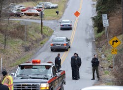 Local law enforcement block off road along Rt. 22 near the Canoe Creek State Park, Pa. while investigating a shooting on Dec. 21. Local law enforcement block off road along Rt. 22 near the Canoe Creek State Park, Pa. while investigating a shooting on Dec. 21.