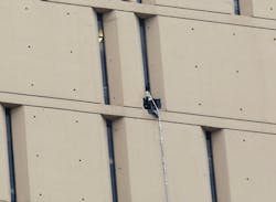 A rope dangles from a window on the back side of the Metropolitan Correctional Center on Dec. 18 in Chicago. A rope dangles from a window on the back side of the Metropolitan Correctional Center on Dec. 18 in Chicago.