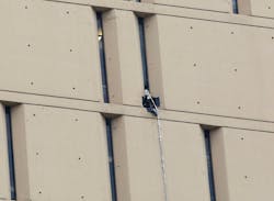 A rope dangles from a window on the back side of the Metropolitan Correctional Center on Dec. 18 in Chicago.