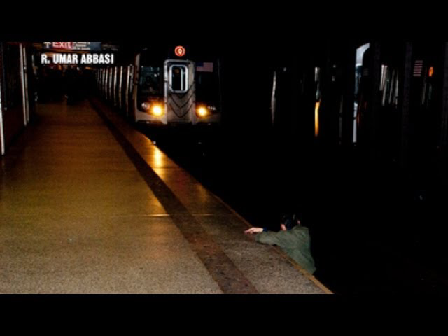 Police Search for Suspect in NYC Subway Fall | Officer