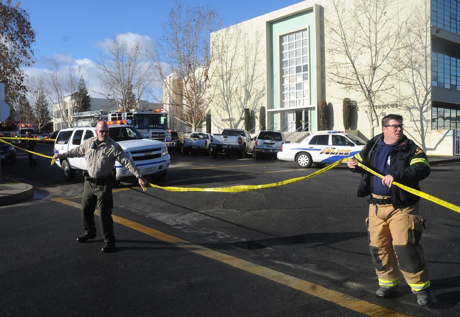 Officials tape off an area at Taft Union High School following a shooting on Jan. 10.