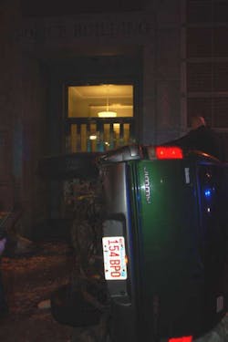 An SUV lies on the sidewalk in front of the Holyoke Police Department on Jan. 5 in Holyoke, Mass. An SUV lies on the sidewalk in front of the Holyoke Police Department on Jan. 5 in Holyoke, Mass.