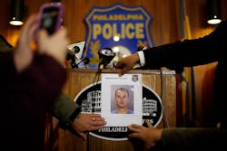 A photograph of 36-year-old Jason Smith is displayed at a news conference on Jan. 24 in Philadelphia.