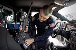 Memphis Police Officer Shannon Merritt places an AR-15 rifle in his car before leaving Crump Station in Memphis, Tenn. on Jan. 16. Memphis Police Officer Shannon Merritt places an AR-15 rifle in his car before leaving Crump Station in Memphis, Tenn. on Jan. 16.