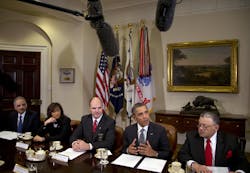 President Barack Obama speaks to media as he meets with representatives from Major Cities Chiefs Association and Major County Sheriffs Association in the Roosevelt Room of the White House on Jan. 28.