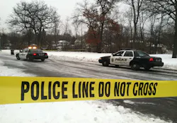 Police search the area near where an armed suspect robbed the Kowalski on Grand market and was later shot by St. Paul officers on Dec. 17, 2012. Police search the area near where an armed suspect robbed the Kowalski on Grand market and was later shot by St. Paul officers on Dec. 17, 2012.