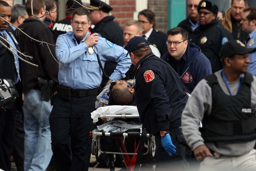 Police and emergency personal respond to a shooting victim at Stevens Institute of Business and Arts in St. Louis on Jan. 15.