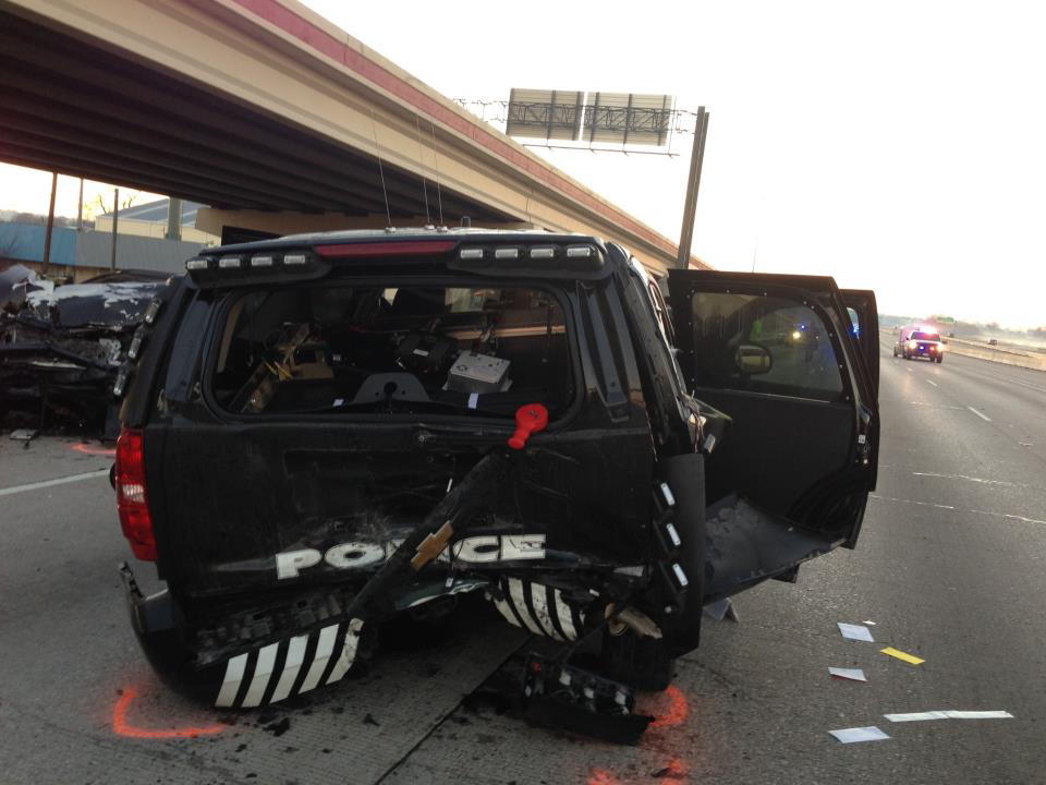 Two Carrollton police officers and a suspected drunken driver sitting in their car were injured Sunday morning when another suspected drunken driver rear-ended the patrol car.