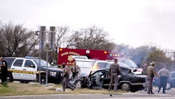 Emergency personnel are on the scene of a crash and shootout with police involving the driver of a black Cadillac with Colorado plates in Decatur, Texas on March 21. Emergency personnel are on the scene of a crash and shootout with police involving the driver of a black Cadillac with Colorado plates in Decatur, Texas on March 21.
