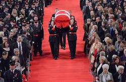 Pallbearers carry the casket of Const. Jennifer Kovach at her funeral in Guelph, Ontario, Canada, on March 21.