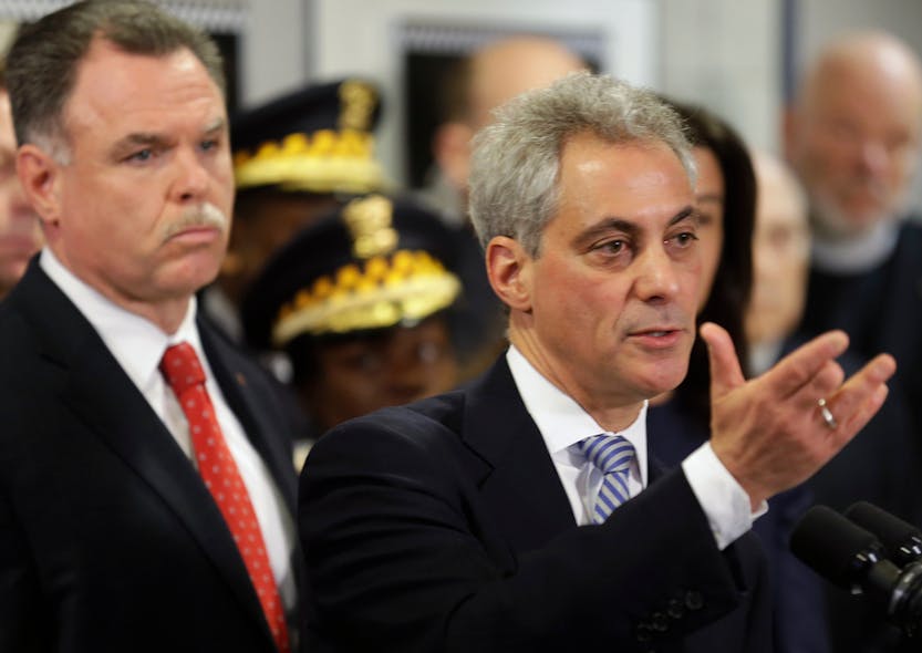 Chicago Mayor Rahm Emanuel, right, and Police Superintendent Garry McCarthy discuss gun violence at a news conference.
