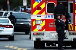 A Memphis police officer comforts a small child outside an ambulance on the 900 block of Mississippi Street on March 4. A Memphis police officer comforts a small child outside an ambulance on the 900 block of Mississippi Street on March 4.