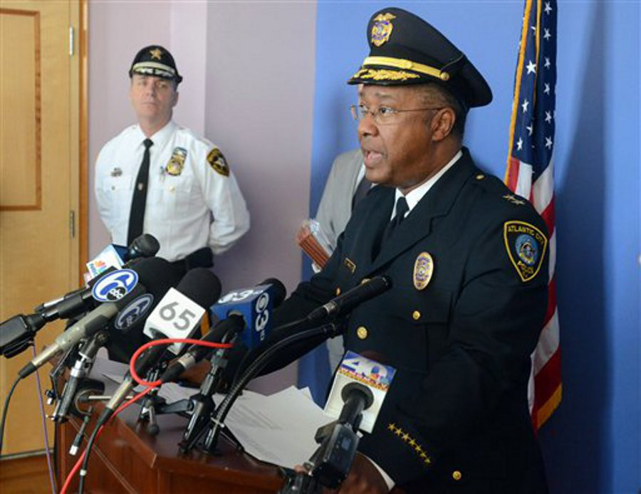 With Atlantic County Sheriff, Frank Balles in background, Atlantic City Police Chief, Ernest Jubilee responds to questions during a news conference at the United States Attorney's Office, in Camden, N.J. on March 26.